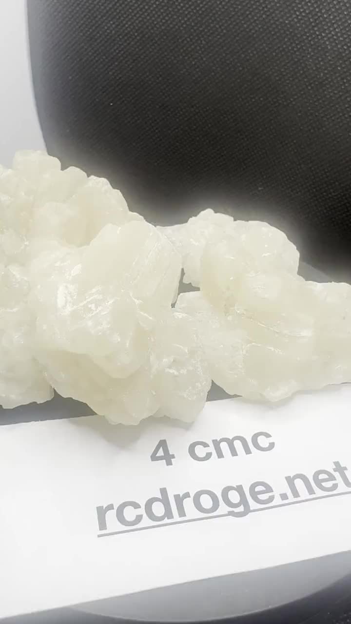 4-CMC crystals with a batch card.
